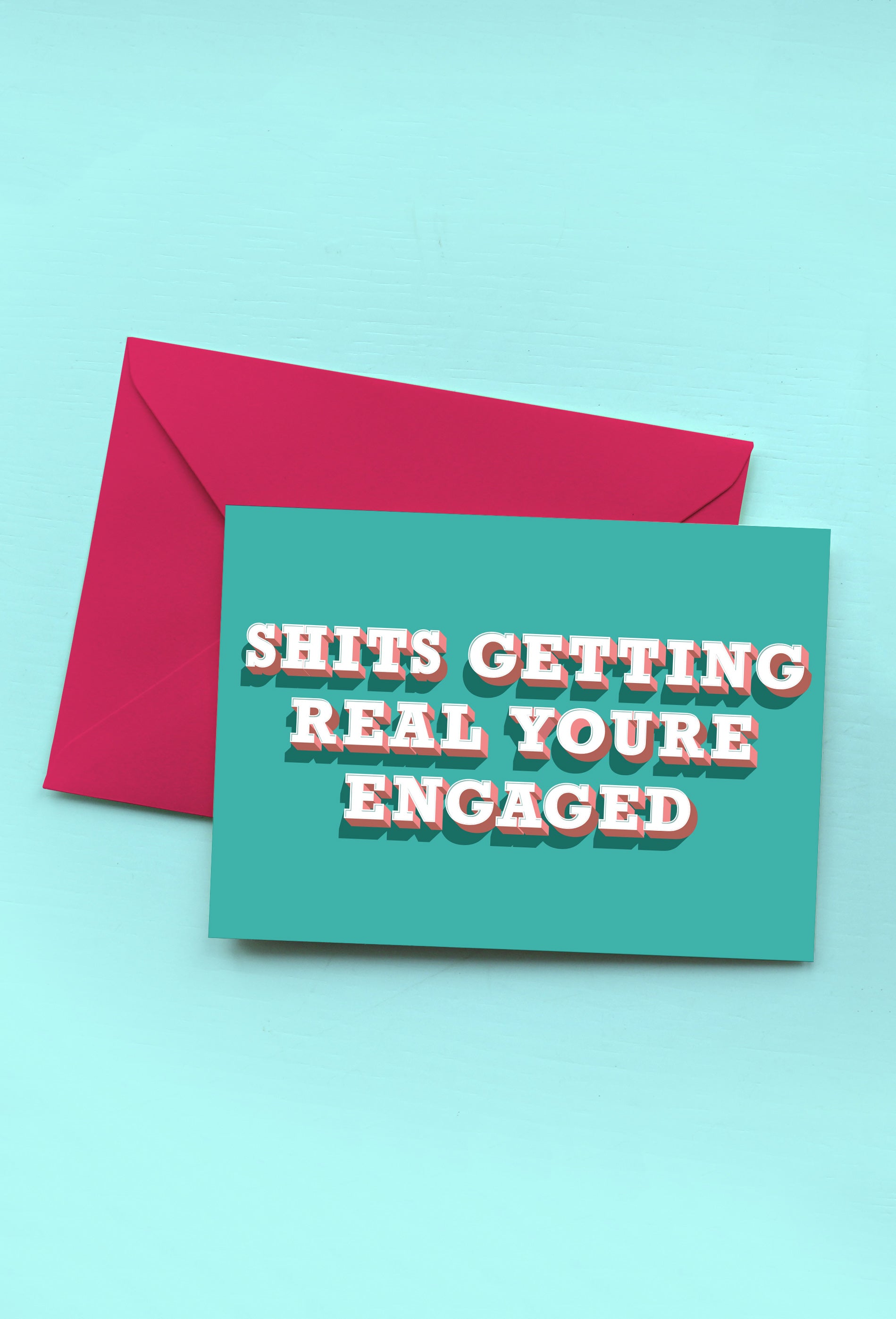 SHITS GETTING REAL YOU'RE ENGAGED - GREETINGS CARD